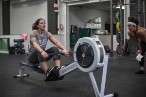 Female athlete on the rowing machine.