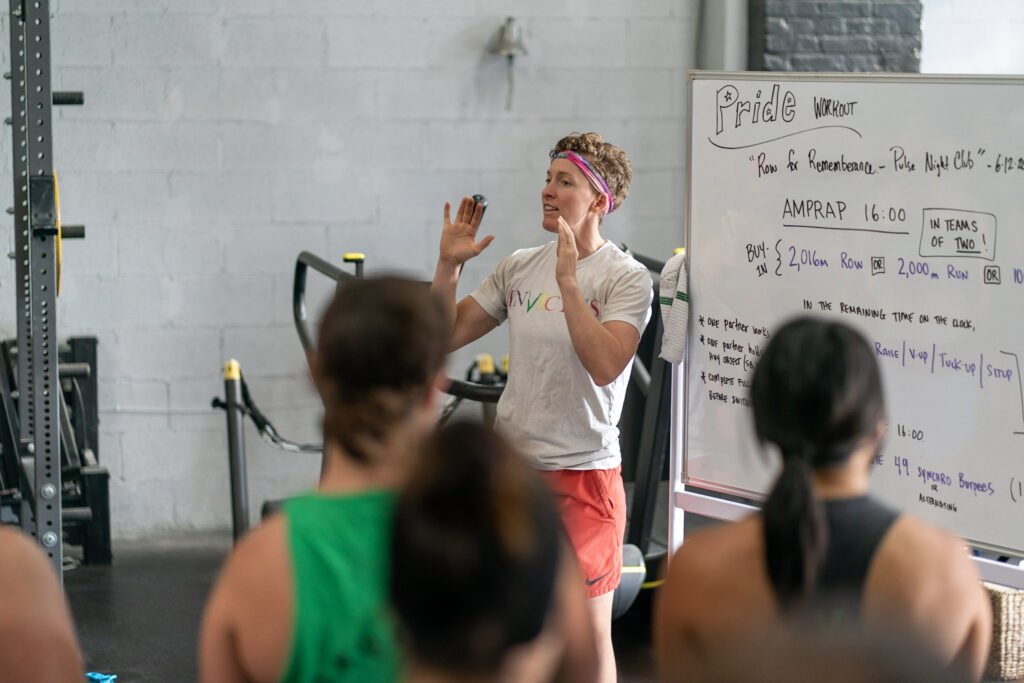 Coach Kirsten Ahrendt, founder of Invictus University, coaches a group of athletes. 