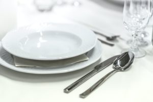 Empty place setting with empty plates.