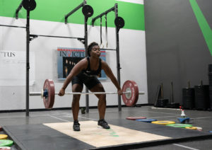 Invictus female athlete on the podium for the American Open.