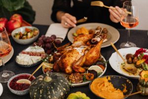 Full spread of food on the Thanksgiving table.